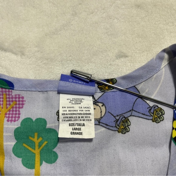 DISNEY Womens Eeyore Roller Speedway Long Sleeve Scrub Top Blue Size Large - Picture 7 of 9